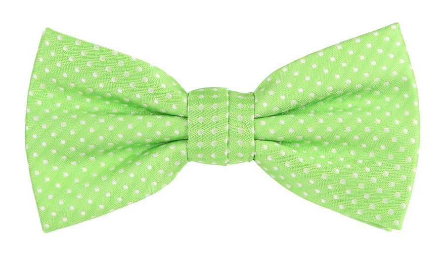 a lime green bow tie with small white spotted design