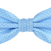 a sky blue bow tie with small white spotted print woven all over