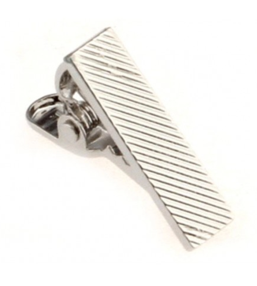 a silver tie clip with diagonal stripes on it