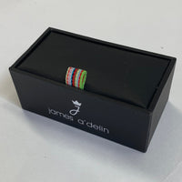 a small gift box with mens tie clips inside