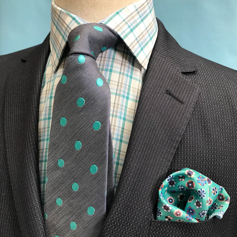 james adelin blue and grey window pane check long sleeve shirt under a grey suit