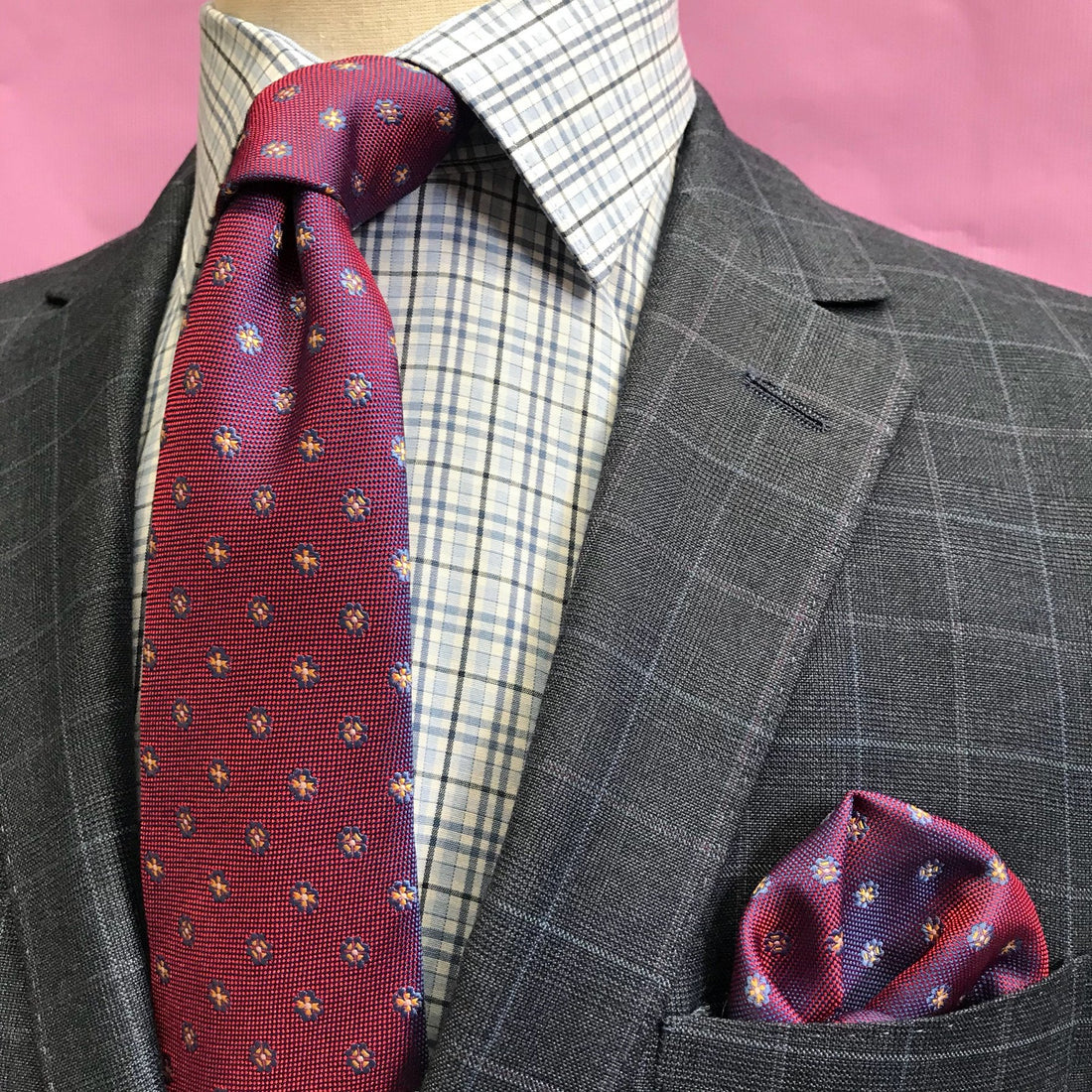 the james adelin window pane check business shirt under a grey jacket