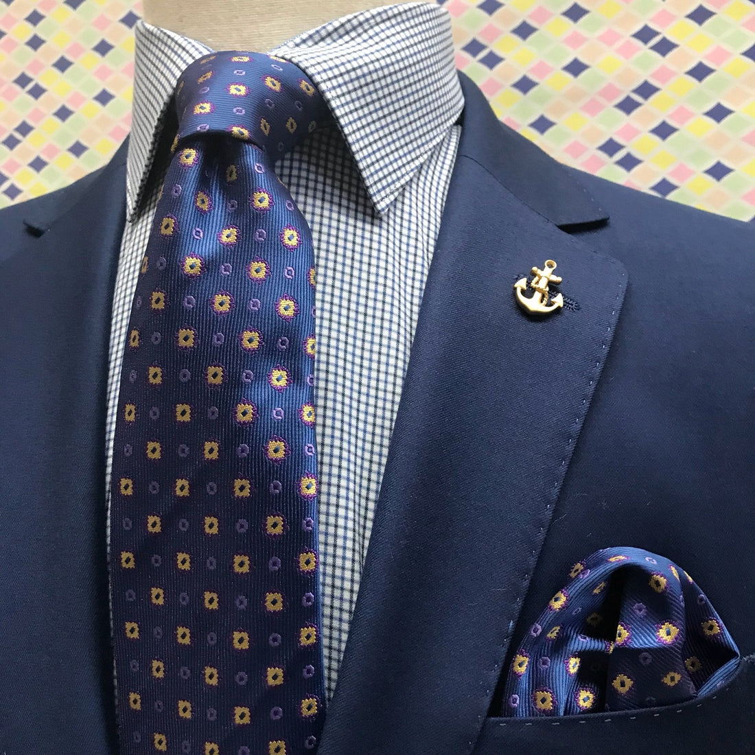 navy blue mini gingham checked mens shirt under a navy blue suit jacket