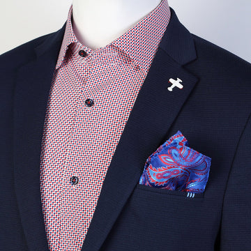 a navy blue blazer with red and blue printed shirt underneath