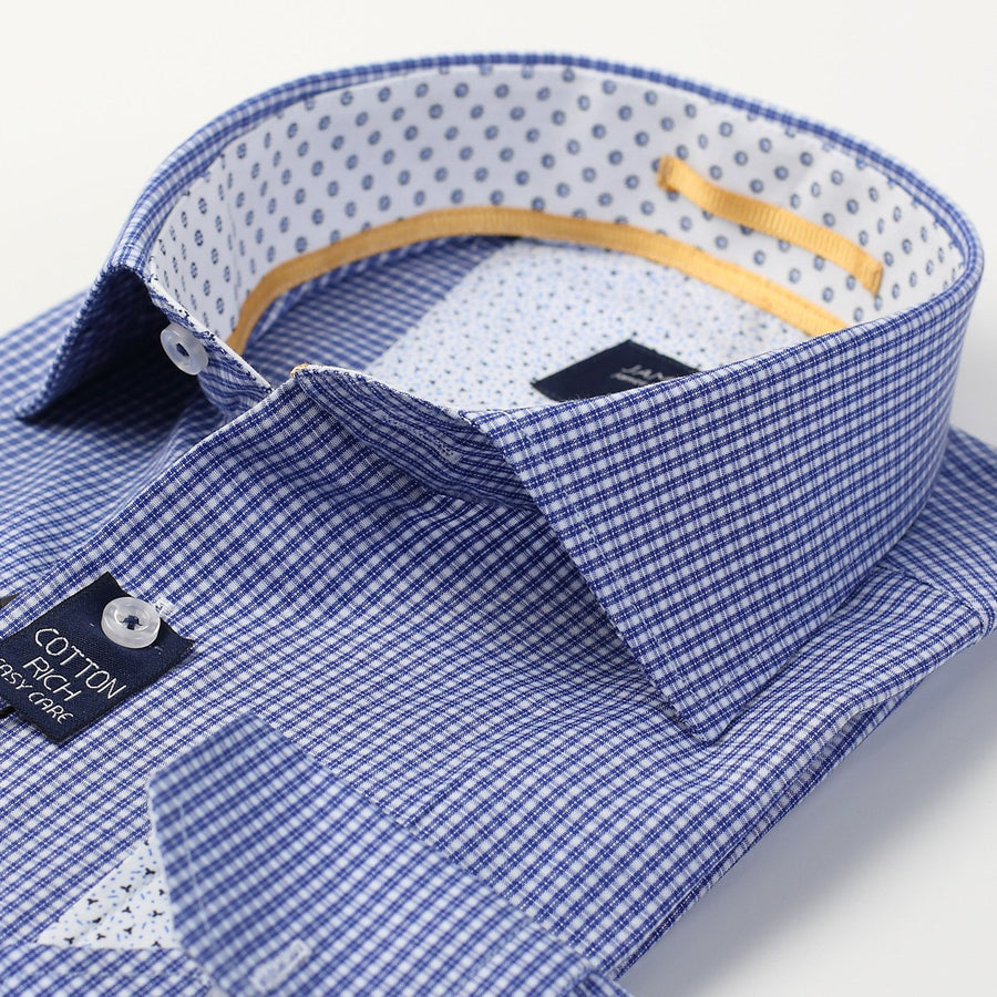 a close up of the collar on the navy and white check long sleeve mens business shirt