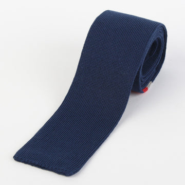 James Adelin Mens Knitted Tie in Navy and Red Placement Stripe