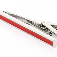 a silver chrome tie clip with red accents 