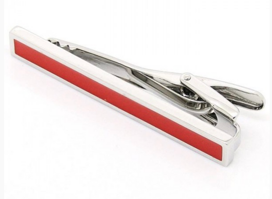 a silver chrome tie clip with red accents 