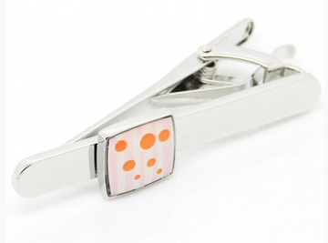 mens silver chrome tie clip with a orange spotted square badge feature