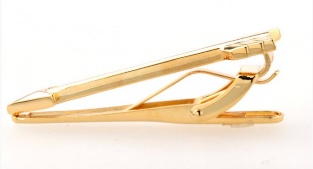 James Adelin arrow mens tie clip in gold showing the shiny gold finish