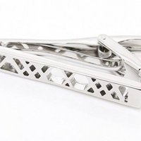 a shiny finish silver mens tie clip with a criss cross pattern