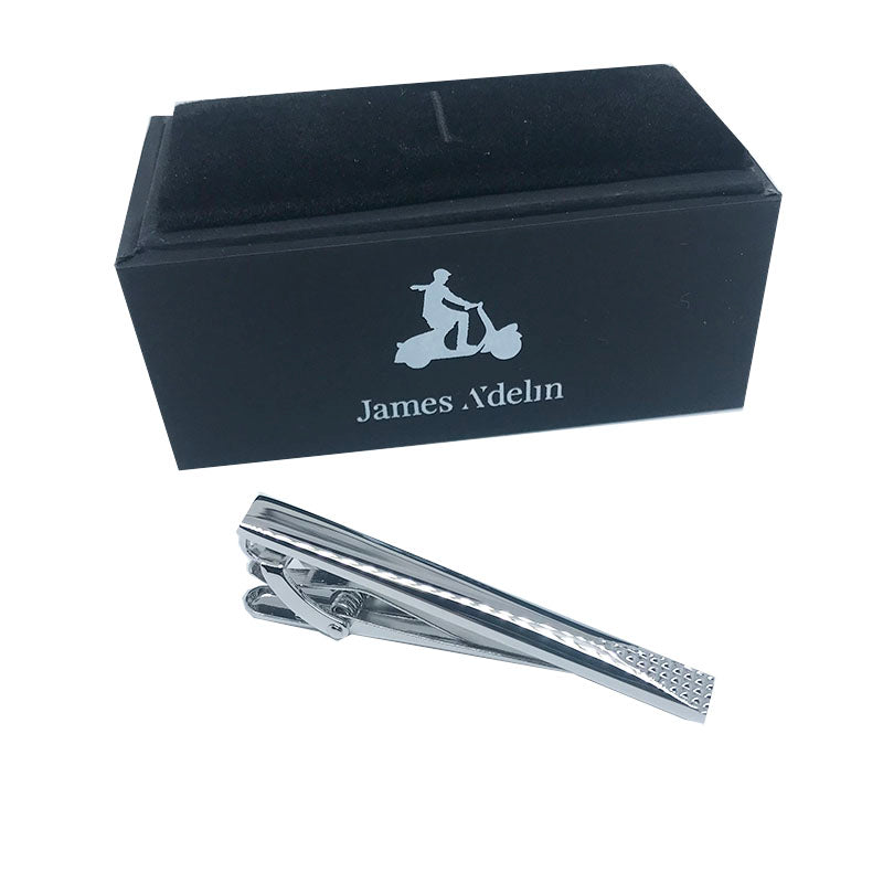 a mens tie clip in a black james adelin box